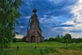 Cloud sky over the wooden church at Shirkov Pogost Royalty Free Stock Photo